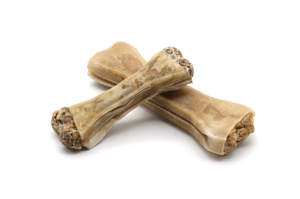 Rinderkauknochen mit Ente und Apfel